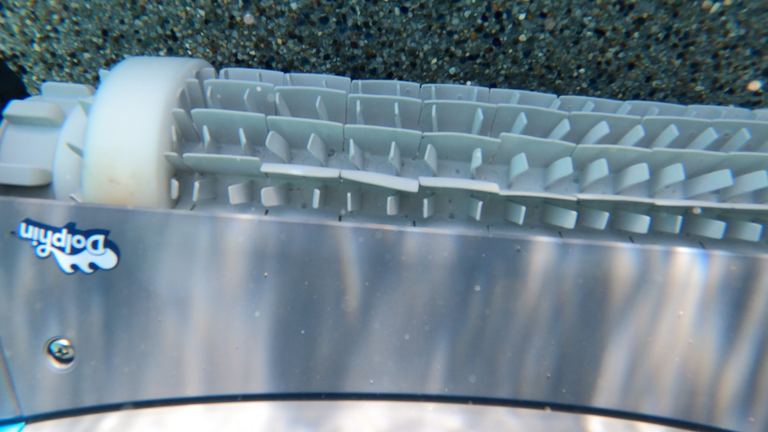 Dolphin Premier Underwater Closeup Brushes Cleaning Pebble Bottom