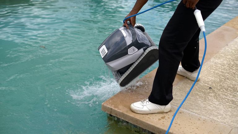 Dolphin Quantum Person Lowering Robot Into Pool Water