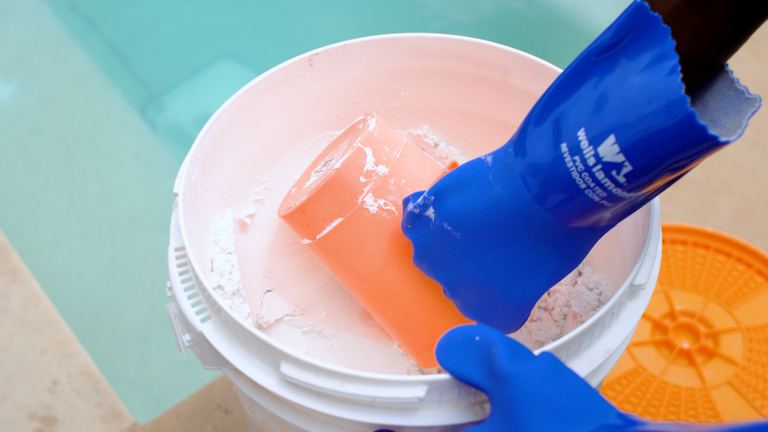 Leslies 3 Inch Jumbo Tabs Gloved Hand Grabbing Scoop In Granules